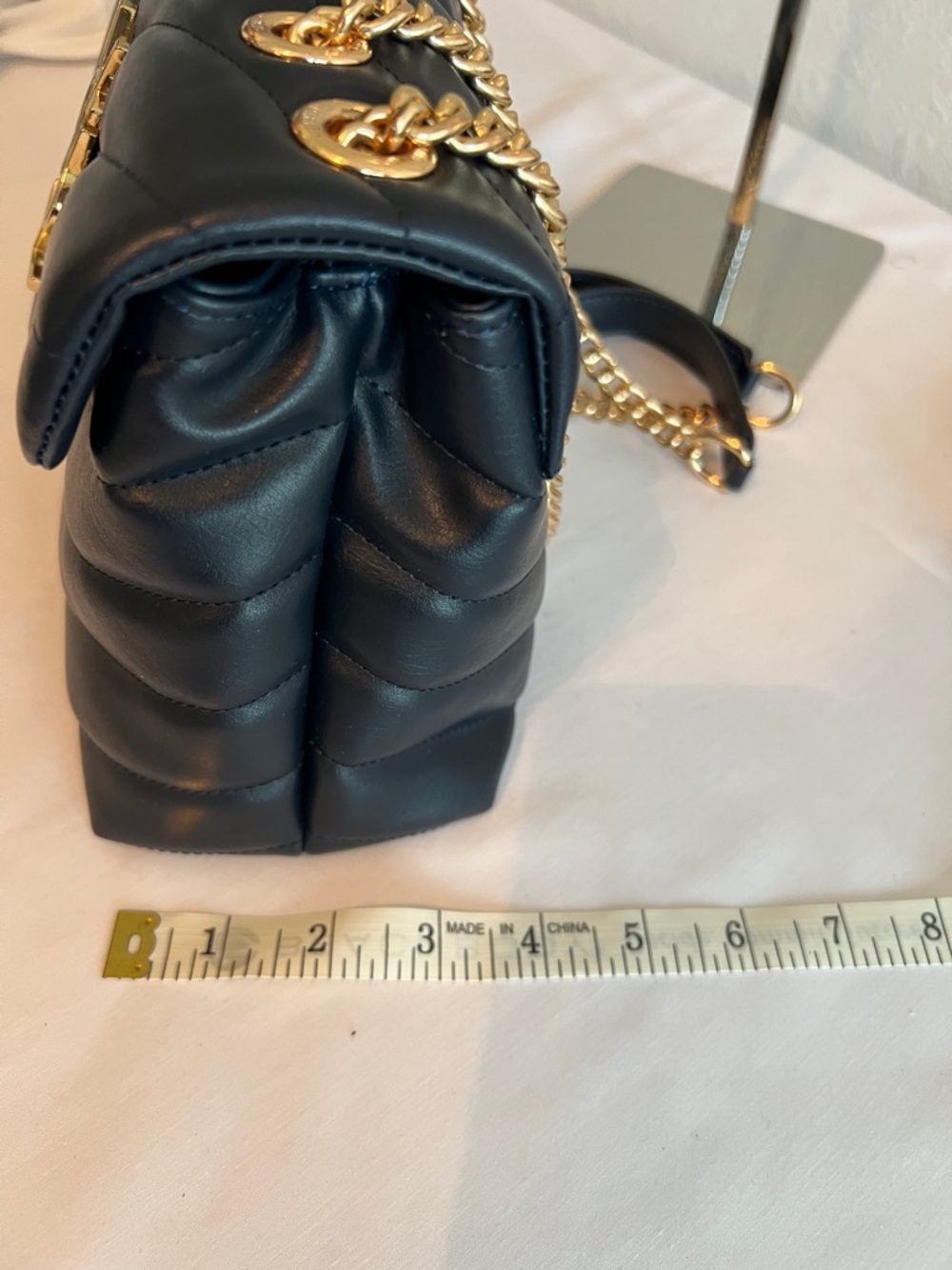 Yves Saint Laurent Navy Blue with gold tone chain and emblem. - Picture 11 of 11
